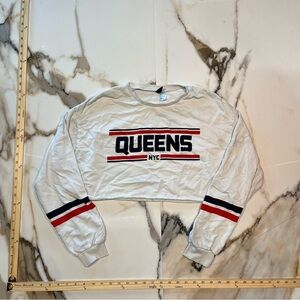 Divided Cream Ribbed Crop Top with Black Logo Tag